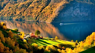 Обои на рабочий стол Небольшая деревня Reine / Рейне на Lofoten Islands,  Norway / Лофотенских островах, Норвегия, фотограф Raphael Messmer, обои для рабочего  стола, скачать обои, обои бесплатно