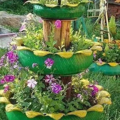 Поделки из шин: необычные идеи, как сделать красивую клумбу из шин для  цветов своими руками. 105 фото-идей для сада, огорода и частного дома