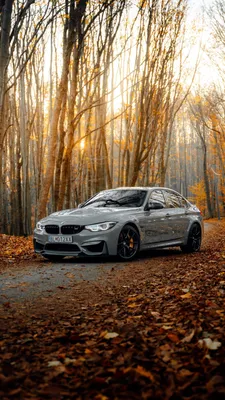 Download Enjoy Unrivaled Tech and Style With the BMW iPhone Wallpaper |  Wallpapers.com