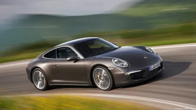 Обои на рабочий стол Porsche 911 / Порше 911 мчится по треку на закате дня,  обои для рабочего стола, скачать обои, обои бесплатно