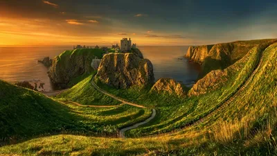 Обои на рабочий стол Замок Данноттар / Dunnottar Castle - средневековый  замок, который расположен на восточном побережье Шотландии. Фотограф  Krzysztof Browko, обои для рабочего стола, скачать обои, обои бесплатно